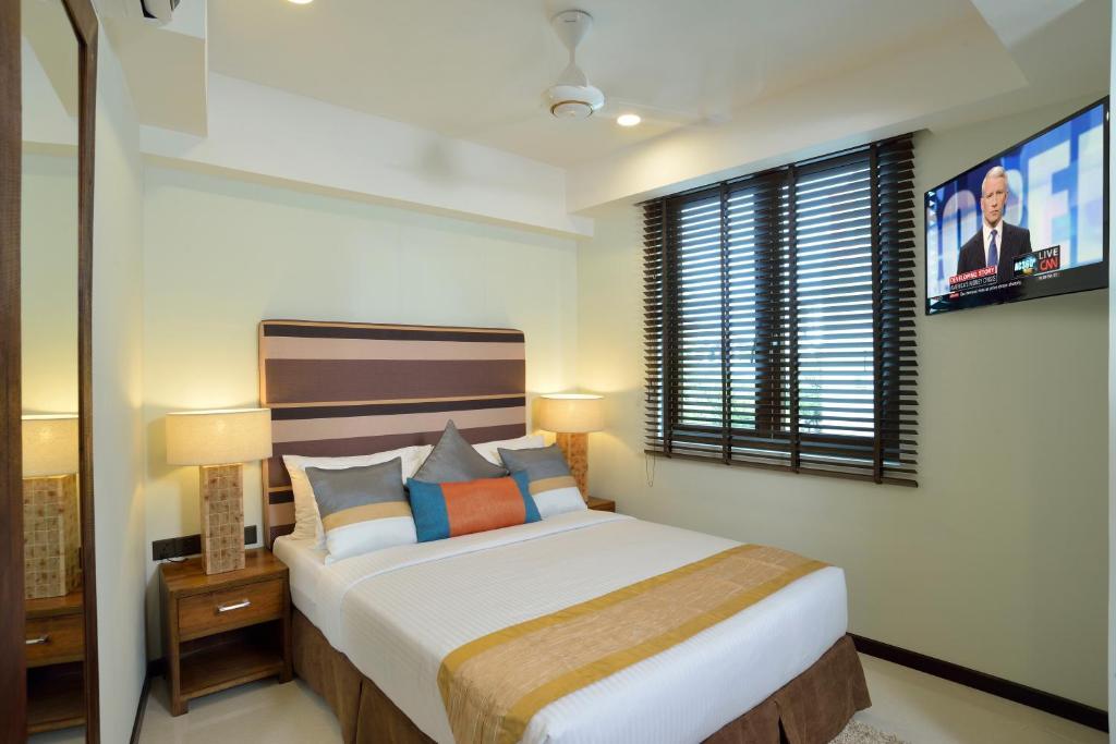 Superior Double Room Return Airport Transfer on Food & Beverage Complimentary Gym Access