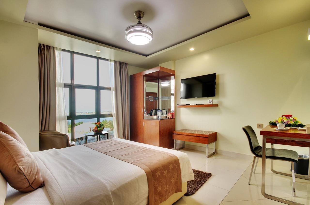 Deluxe Room Ocean View Return Airport Transfer on Food & Beverage Spa