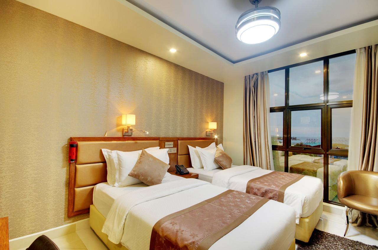 Deluxe Room Ocean View Return Airport Transfer on Food & Beverage Spa
