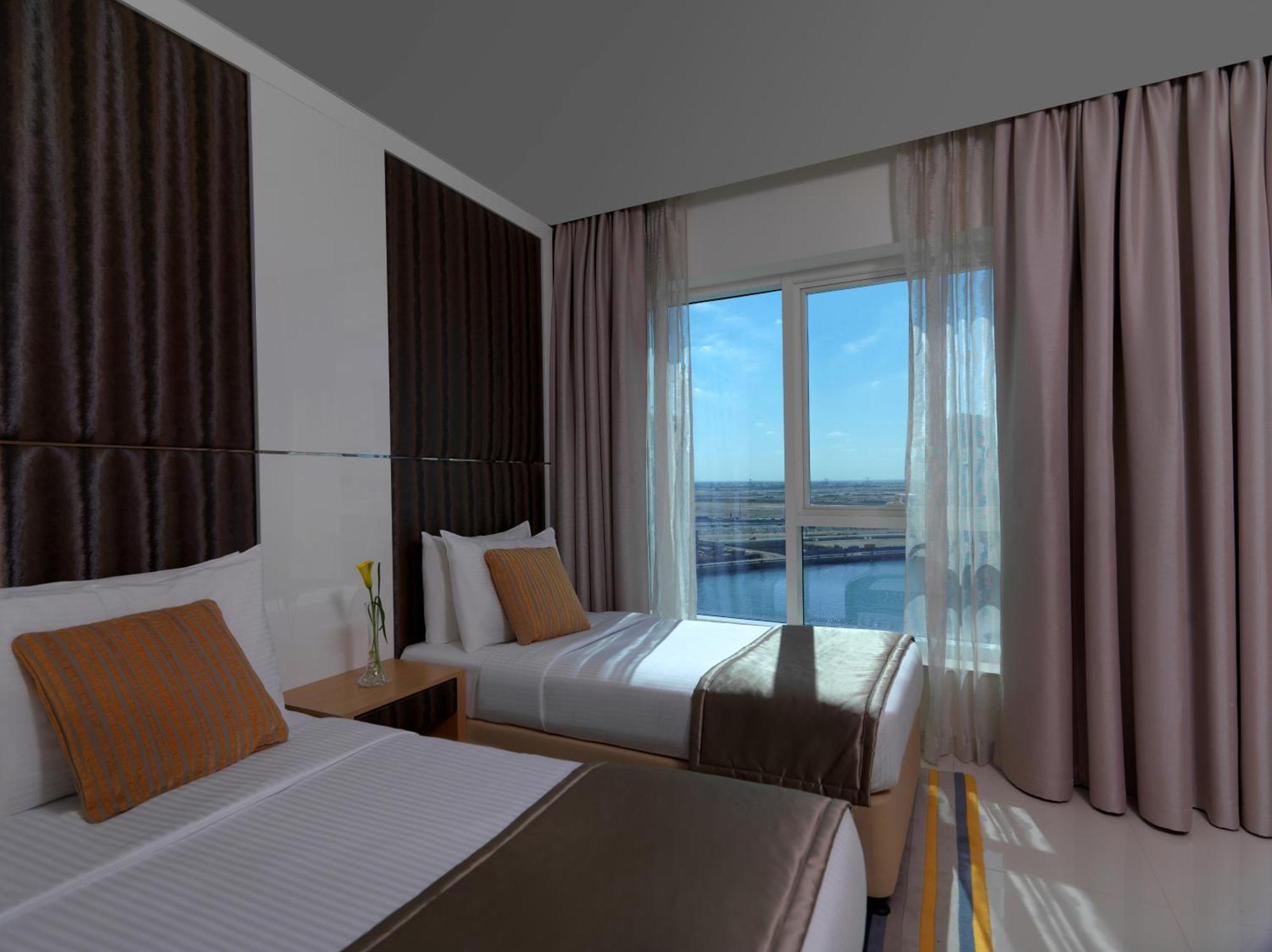 Three Bedroom Suite kitchenette City Skyline View