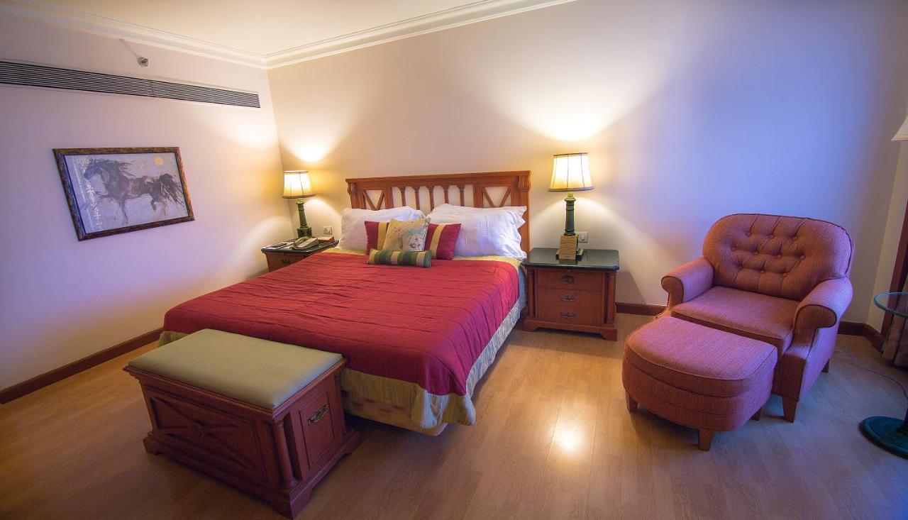 Orchid Suite Separate Living Room Two Way Airport Transfers to T1 only Happy Hours