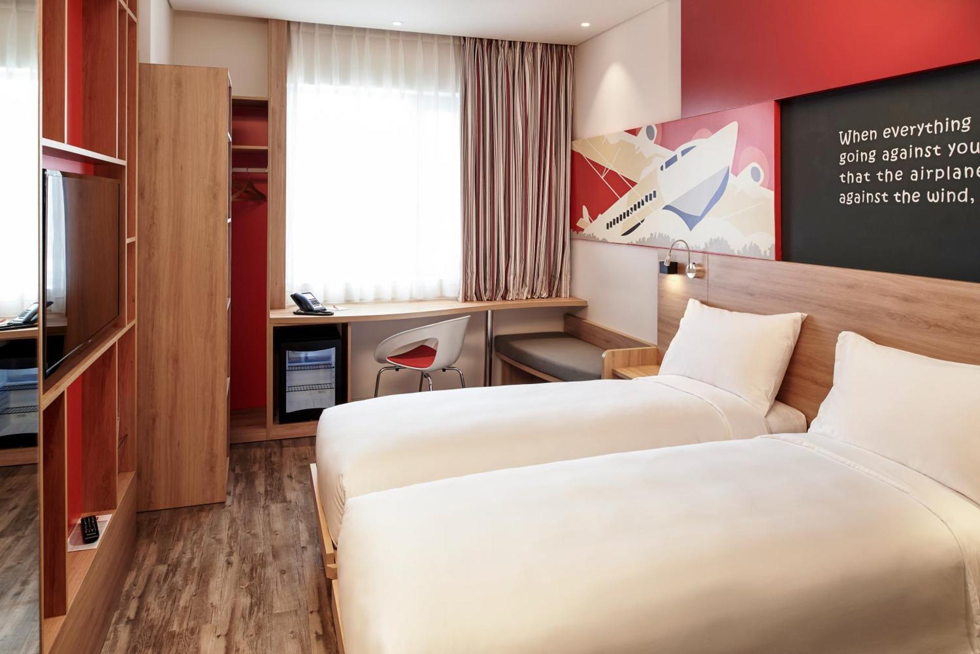 Standard Twin Room Complimentary Round-trip Transfer to International Terminal upon request