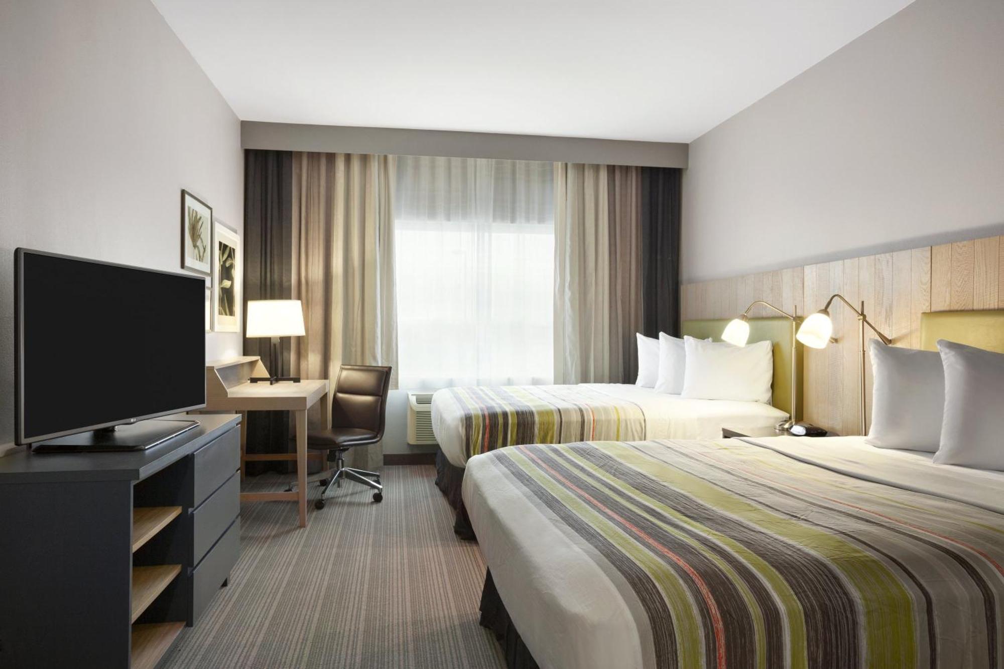 Quadruple Room Two Queen Beds Disability Access or Non Smoking