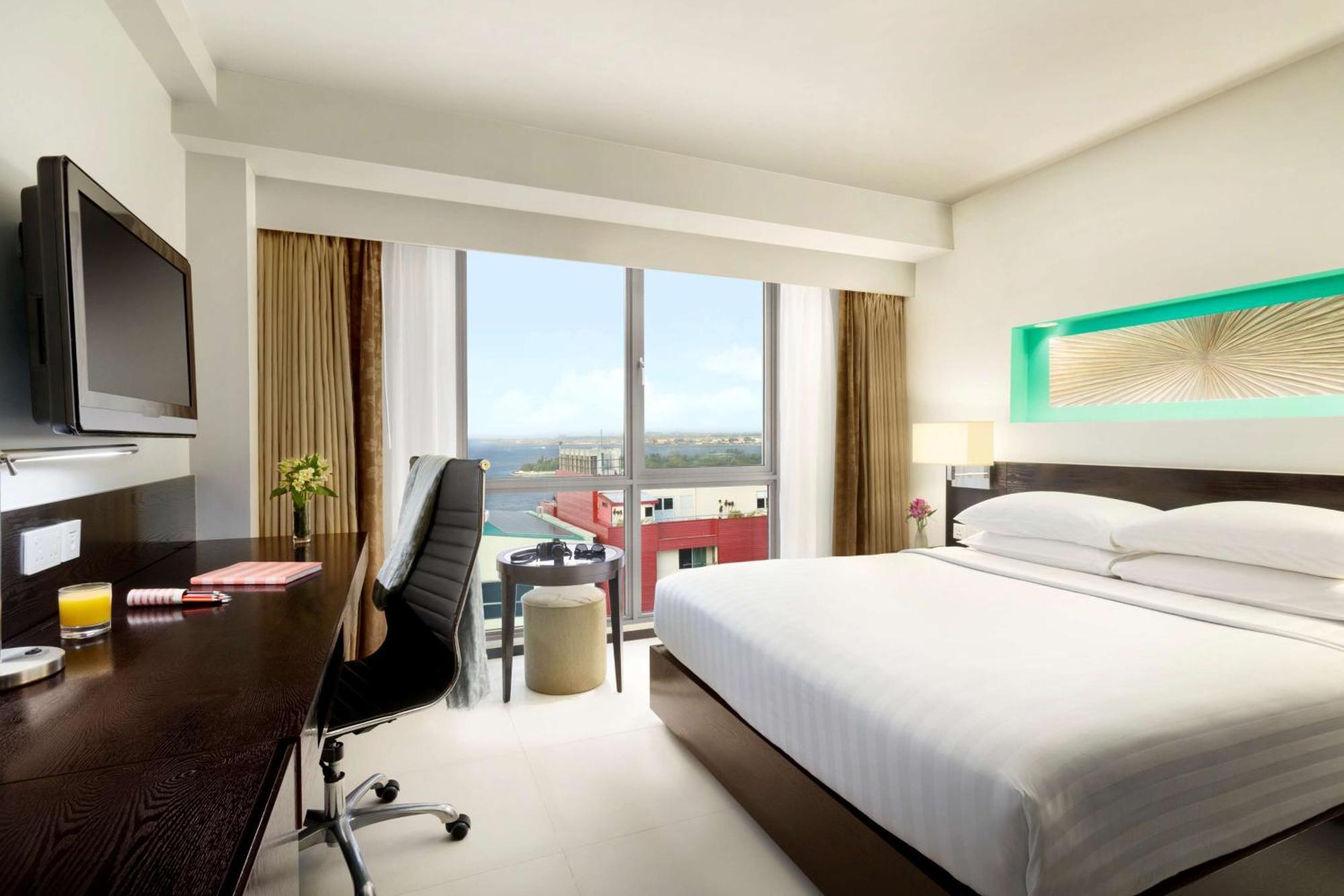 Deluxe Queen Room Ocean View Return Airport Transfer Complimentary Wifi